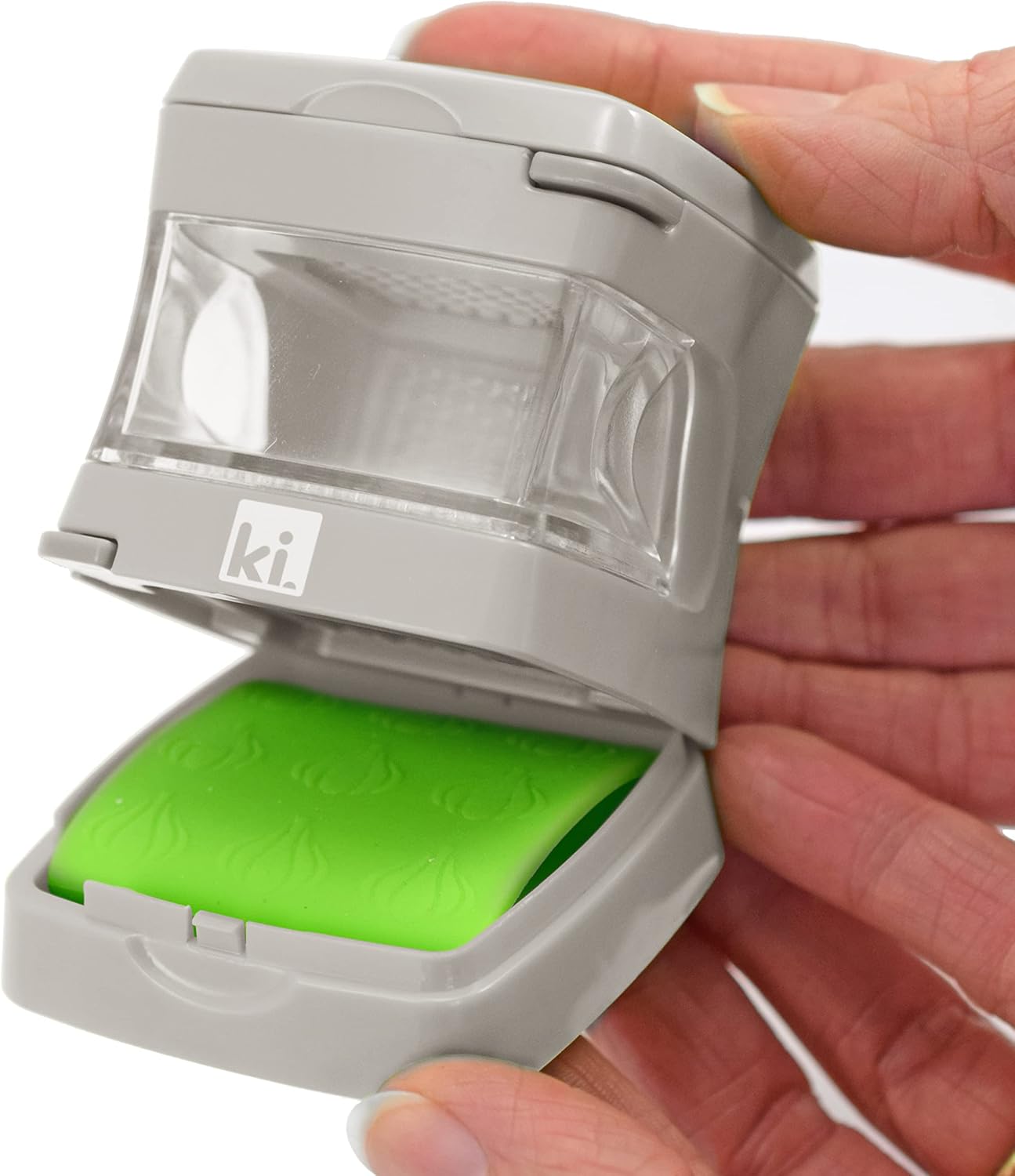 Garlic-A-Peel Garlic Press, Crusher, Cutter, Mincer, and Storage Container - Includes Silicone Garlic Peeler - Easy to Clean - Stainless Steel Blades – (Cream), standard