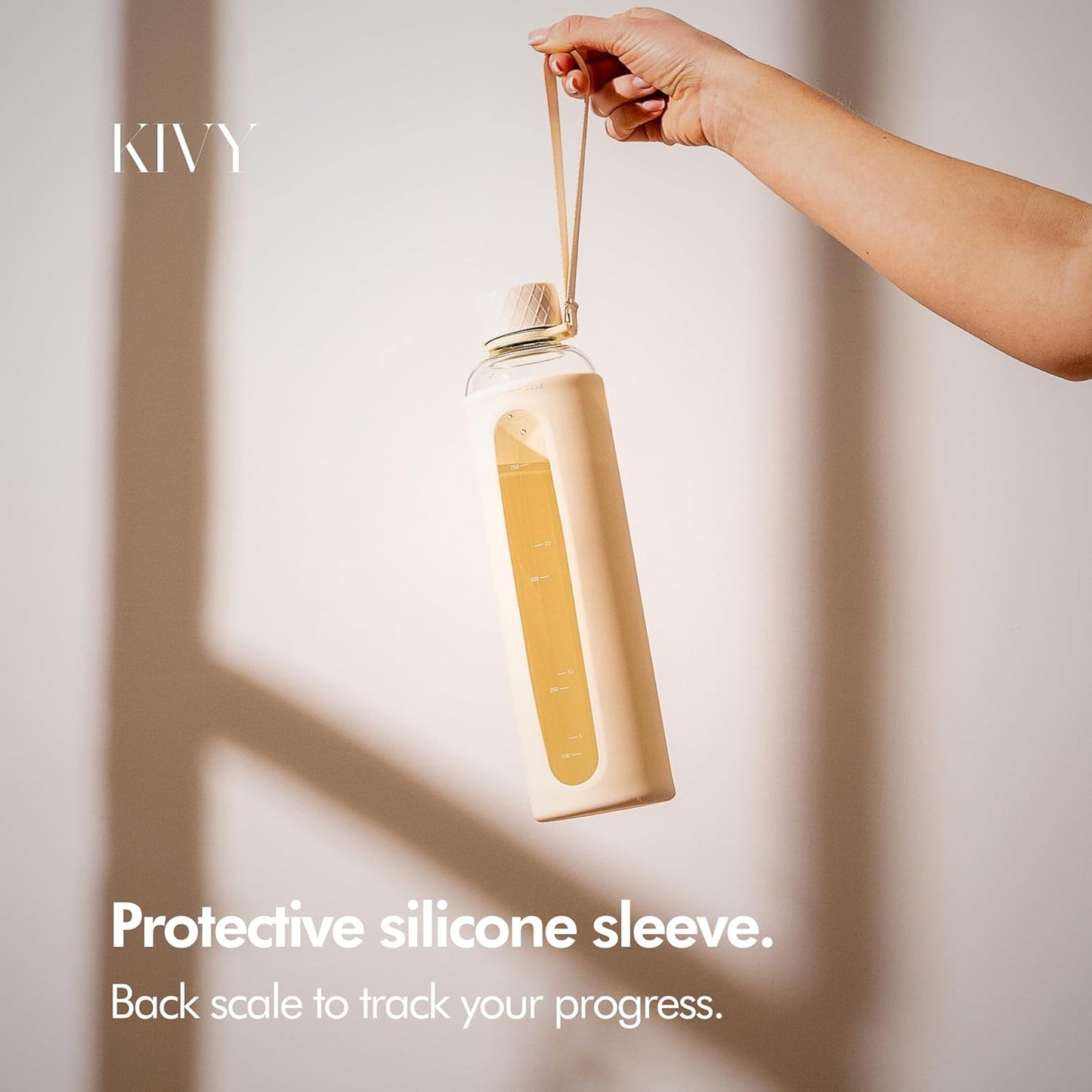 KIVY Glass Water Bottle with Silicone Sleeve 32 oz [WITH MEASUREMENT] - Borosilicate Glass Water Bottle Screw Top - Clear Bottles with Measurement Marking - Slim Waterbottle Aesthetic - Cream White